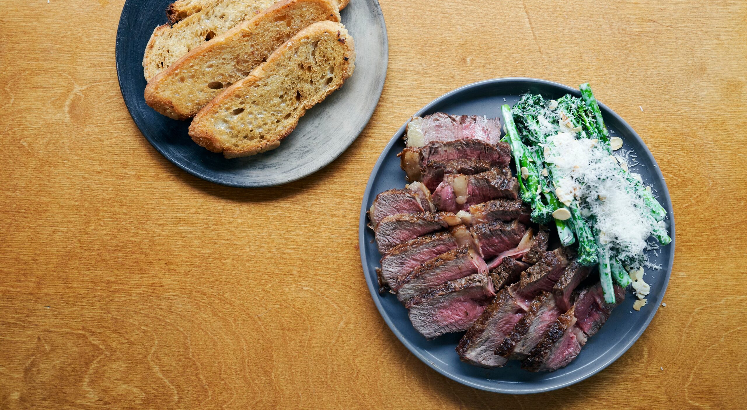 Grass-fed Irish Côte de boeuf with almond Caesar salad, beef dripping toast